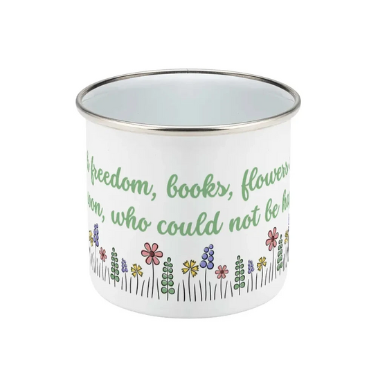 White enamel bug with floral design and text on a white background, featuring an inspirational quote b Oscar Wilde: "With freedom, books, flowers and the moon who could not be perfectly happy?"