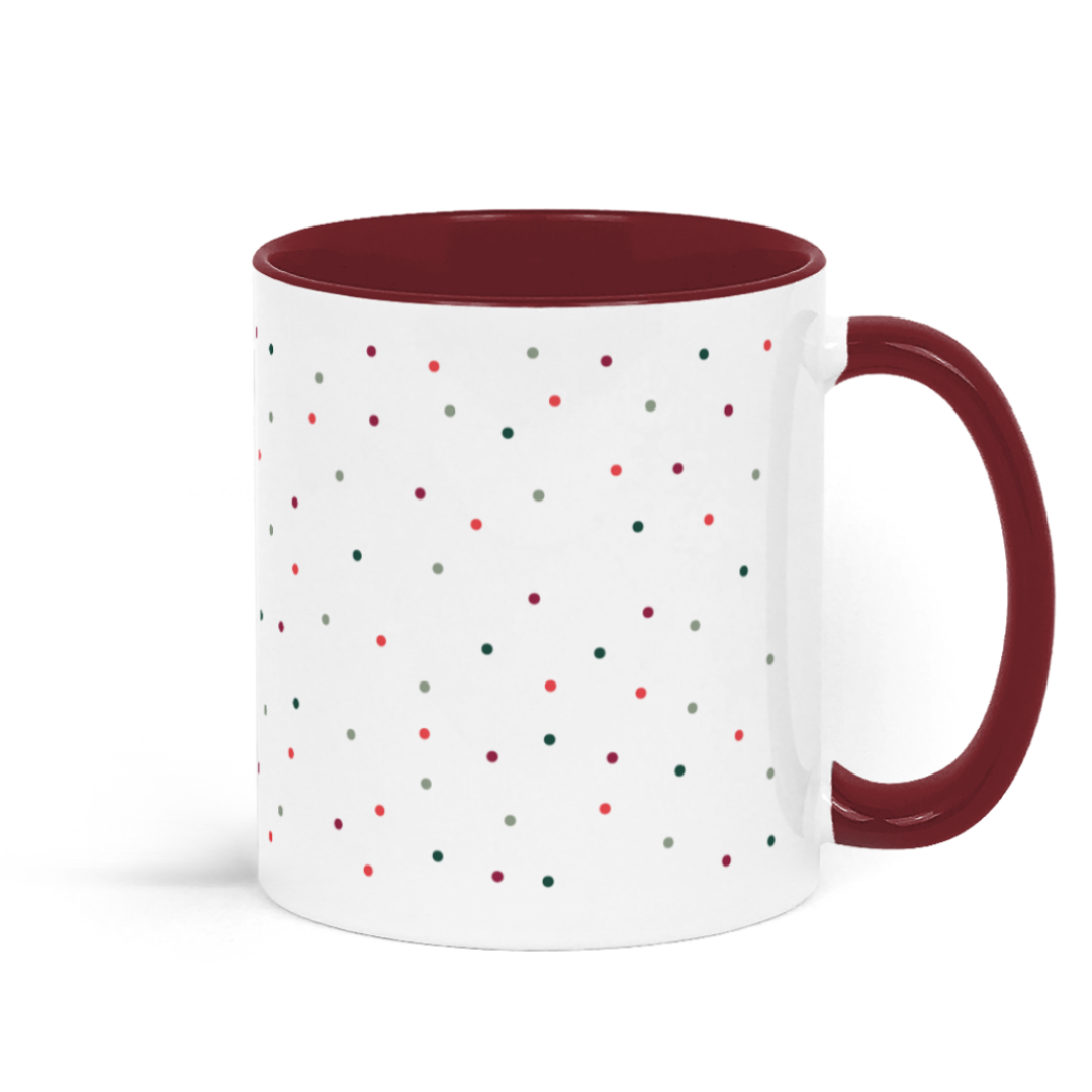 Images shows back view of our Cosy Winter Reading Mug For Book-lovers featuring the phrase "Chilly Days, Cosy Nights & Bookish Vibes" in red lettering against a festive red and green polka dot design - a perfect Christmas gift for book-lovers this holiday season.