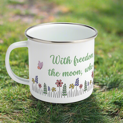 White enamel bug with floral design and text on a white background, featuring an inspirational quote b Oscar Wilde: "With freedom, books, flowers and the moon who could not be perfectly happy?"