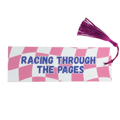 Images shows a bookmark with the words 'Racing Through The Pages' against a pink and white chequered flag inspired background