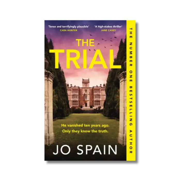 Book cover of 'The Trial' by Jo Spain with a yellow border and castle image.