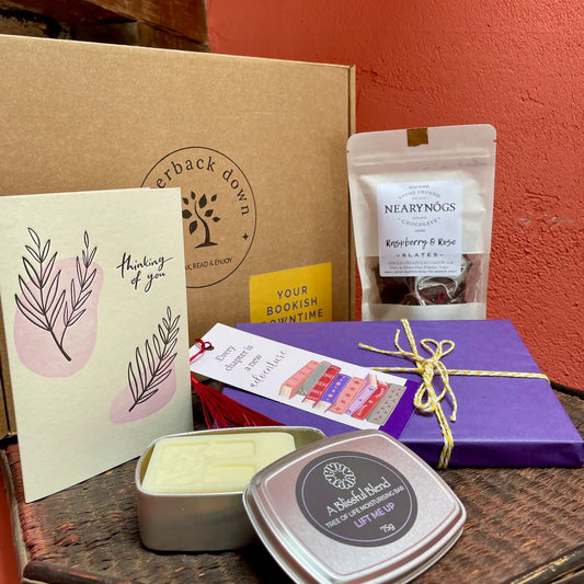 A 'Thinking of You' gift box for booklovers - which includes a surprise book, moisturising body bar, artisan chocolate and a thoughtful card